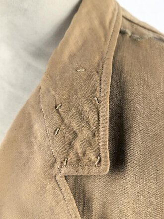 Tropenfeldbluse im Stil der Luftwaffe. Vermutlich ursprünglich Französisch ? , mit deutscher Stempelung versehen