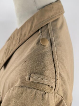 Tropenfeldbluse im Stil der Luftwaffe. Vermutlich ursprünglich Französisch ? , mit deutscher Stempelung versehen