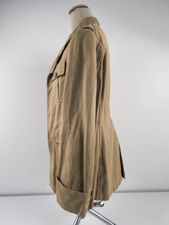 Tropenfeldbluse im Stil der Luftwaffe. Vermutlich ursprünglich Französisch ? , mit deutscher Stempelung versehen