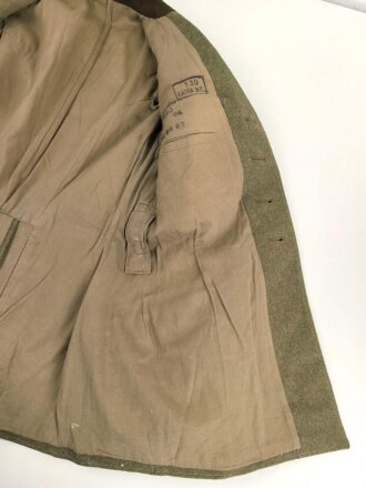 Reichsarbeitsdienst , Dienstrock in gutem Zustand. Kammerstück mit original vernähten Kragenspiegeln, der Ärmelspaten vermutlich neuzeitlich angebracht