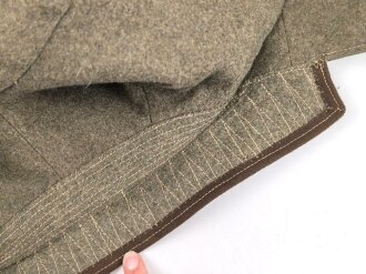 Reichsarbeitsdienst , Dienstrock in gutem Zustand. Kammerstück mit original vernähten Kragenspiegeln, der Ärmelspaten vermutlich neuzeitlich angebracht
