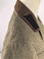 Reichsarbeitsdienst , Dienstrock in gutem Zustand. Kammerstück mit original vernähten Kragenspiegeln, der Ärmelspaten vermutlich neuzeitlich angebracht