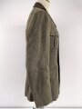 Reichsarbeitsdienst , Dienstrock in gutem Zustand. Kammerstück mit original vernähten Kragenspiegeln, der Ärmelspaten vermutlich neuzeitlich angebracht
