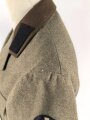 Reichsarbeitsdienst , Dienstrock in gutem Zustand. Kammerstück mit original vernähten Kragenspiegeln, der Ärmelspaten vermutlich neuzeitlich angebracht