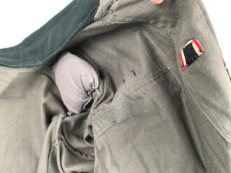 Heer, Feldbluse Modell 1936 aus leichten Sommerstoff. Eigentumstück für einen Offizier in der Heeresverwaltung. Sehr guter Zustand, alle Effekten original vernäht