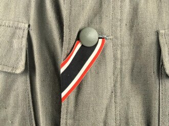 Heer, Feldbluse Modell 1936 aus leichten Sommerstoff. Eigentumstück für einen Offizier in der Heeresverwaltung. Sehr guter Zustand, alle Effekten original vernäht
