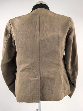 Heer, Feldbluse Modell 1936 für einen Leutnant der Artillerie. Ausführung in leichtem Sommerstoff. Leicht getragenes Eigentumstück, die Effekten vermutlich neuzeitlich wieder angenäht