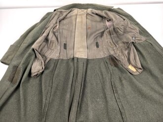 Heer, Mantel für Mannschaften Modell 1940. Getragenes Kammerstück , ungereinigt, die zweite Knopfreihe abgetrennt.