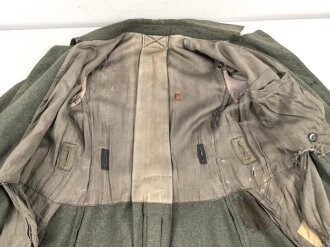 Heer, Mantel für Mannschaften Modell 1940. Getragenes Kammerstück , ungereinigt, die zweite Knopfreihe abgetrennt.