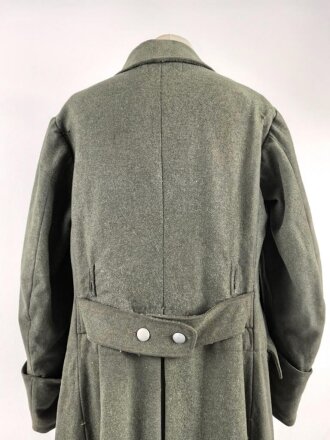Heer, Mantel für Mannschaften Modell 1940. Getragenes Kammerstück , ungereinigt, die zweite Knopfreihe abgetrennt.
