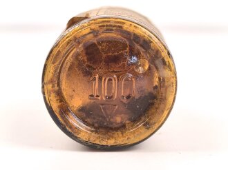 Glasflasche "Hautentgiftungssalbe" datiert 1943. Gesamthöhe 9,5cm