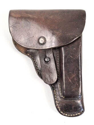 Tasche zur Pistole Modell 27 der Wehrmacht. Getragenes Stück in gutem Gesamtzustand mit reparierter Koppelschlaufe, datiert 1941