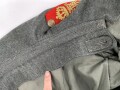 1.Weltkrieg, Feldbluse Modell 1915 für einen Angehörigen im Württembergischen Fußartillerie Regiment No. 13.  Kammerstück in gutem Zustand, lediglich ein Schaden im Bereich der linken Brust.