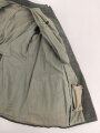 1.Weltkrieg, Feldbluse Modell 1915 für einen Angehörigen im Württembergischen Fußartillerie Regiment No. 13.  Kammerstück in gutem Zustand, lediglich ein Schaden im Bereich der linken Brust.