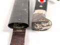 Fahrtenmesser für Angehörige der Hitlerjugend. Hersteller Ernst Pack & Söhne Solingen 1937.Devise deutlich, Griffraute wackelt leicht wie es sein soll. Ungereinigtes Stück in gutem Gesamtzustand