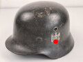 Heer, Stahlhelm Modell 1935. Während des Krieges instandgesetzt und wieder ausgegeben. Deutlich getragen. NS 64
