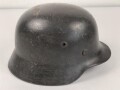 Heer, Stahlhelm Modell 1935. Während des Krieges instandgesetzt und wieder ausgegeben. Deutlich getragen. NS 64
