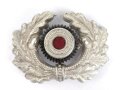 Eichenlaubkranz mit Kokarde für eine Schirmmütze des Heeres. Aluminium, datiert 1939
