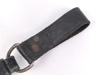 Teil eines Lederhänger für einen NSKK oder SS Dienstdolch. Ungereinigtes Stück