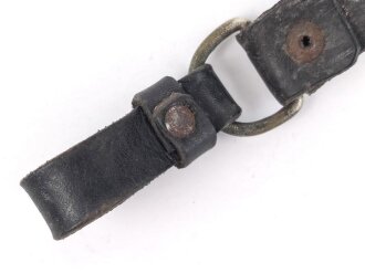 Teil eines Lederhänger für einen NSKK oder SS Dienstdolch. Ungereinigtes Stück