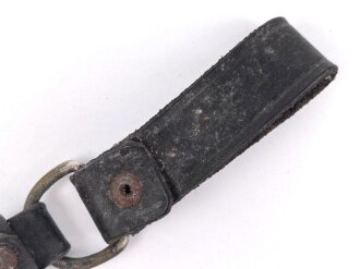 Teil eines Lederhänger für einen NSKK oder SS Dienstdolch. Ungereinigtes Stück