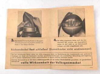 Luftschutz/ Werkschutz, Volksgasmaske 37 in Bereitschaftsbüchse aus Blech. Mit zugehöriger " Anleitung zum Einlegen der Volksgasmaske in die Tragebüchse" für Grubenarbeiter