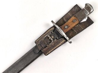 Schweiz, Seitengewehr Modell 1914 mit Sägerücken im Koppelschuh. Guter Gesamtzustand