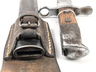 Schweiz, Seitengewehr Modell 1914 mit Sägerücken im Koppelschuh. Guter Gesamtzustand