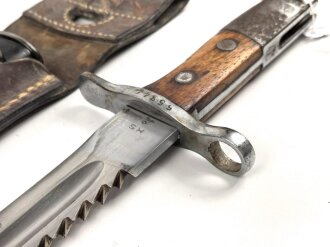 Schweiz, Seitengewehr Modell 1914 mit Sägerücken im Koppelschuh. Guter Gesamtzustand
