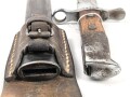 Schweiz, Seitengewehr Modell 1914 mit Sägerücken im Koppelschuh. Guter Gesamtzustand