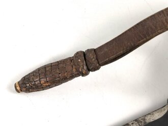 Niederlande, " Klewang" Säbel Modell 1911. Hersteller " Hembrug". Ungereinigtes Stück mit Koppelschuh und dem seltenen Portepee