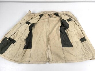 Heer, Feldbluse für Mannschaften Modell 1943. Kammerstück in heller Ausführung. Habe ich in 30 Jahrfen Tätigkeit noch nie gesehen. Ist nicht entfärbt, sondern so produziert. Getragenes Stück