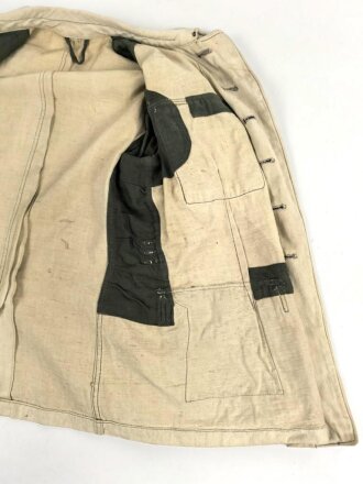 Heer, Feldbluse für Mannschaften Modell 1943. Kammerstück in heller Ausführung. Habe ich in 30 Jahrfen Tätigkeit noch nie gesehen. Ist nicht entfärbt, sondern so produziert. Getragenes Stück
