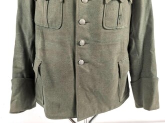 Heer, Feldbluse Modell 1936 für einen Offizier. Stark getragenes Eigentumstück ohne Effekten, ungereinigt
