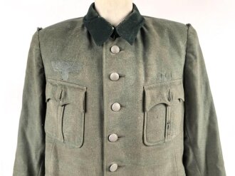 Heer, Feldbluse Modell 1936 für einen Offizier. Stark getragenes Eigentumstück ohne Effekten, ungereinigt