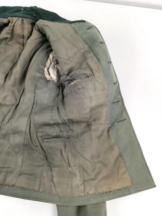 Heer, Feldbluse Modell 1936 für einen Offizier. Stark getragenes Eigentumstück ohne Effekten, ungereinigt