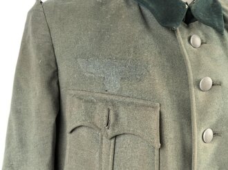 Heer, Feldbluse Modell 1936 für einen Offizier. Stark getragenes Eigentumstück ohne Effekten, ungereinigt