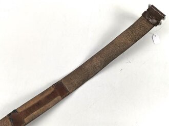 Reichsarbeitsdienst, lederne Feldbinde für Führer. Getragenes Stück, zusammengehörig, Gesamtlänge 94cm