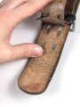 Reichsarbeitsdienst, lederne Feldbinde für Führer. Getragenes Stück, zusammengehörig, Gesamtlänge 94cm