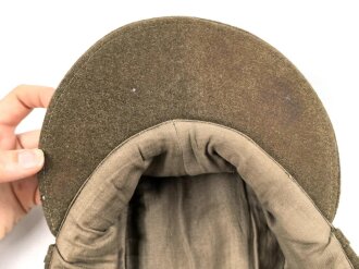 Reichsarbeitsdienst, Feldmütze für Mannschaften. Maschinenvernähtes Emblem, getragenes, leicht angeschmutztes Stück mit leichten Mottenschäden