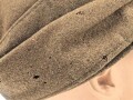 Reichsarbeitsdienst, Feldmütze für Mannschaften. Maschinenvernähtes Emblem, getragenes, leicht angeschmutztes Stück mit leichten Mottenschäden