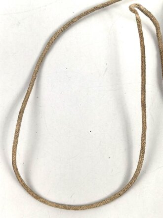 Zugband für ein Stahlhelm Innenfutter der Wehrmacht. UV Negativ, Gesamtlänge 55cm
