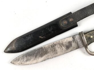 Fahrtenmesser für Angehörige der Hitlerjugend. Ungereinigtes Stück, die Klinge stark gebraucht, Hersteller M7/27 1938
