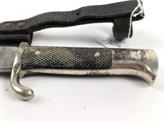 Fahrtenmesser für Angehörige der Hitlerjugend. Ungereinigtes Stück, die Klinge stark gebraucht, Hersteller M7/27 1938