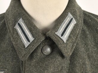 Heer, Feldbluse für Mannschaften Modell 1942,  getragenes Kammerstück in gutem Gesamtzustand, die Effekten neuzeitlich vernäht.