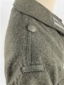 Heer, Feldbluse für Mannschaften Modell 1942,  getragenes Kammerstück in gutem Gesamtzustand, die Effekten neuzeitlich vernäht.
