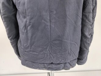 Luftwaffe , heizbare Kanaljacke für Jagdflieger. Sauberes Etikett mit Reichsbetriebsnummer, Alle Druckknöpfe und Reissverschlüsse gängig. Die Vorderseite ausgeblichen ?, sonst sehr guter Zustand