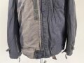 Luftwaffe , heizbare Kanaljacke für Jagdflieger. Sauberes Etikett mit Reichsbetriebsnummer, Alle Druckknöpfe und Reissverschlüsse gängig. Die Vorderseite ausgeblichen ?, sonst sehr guter Zustand