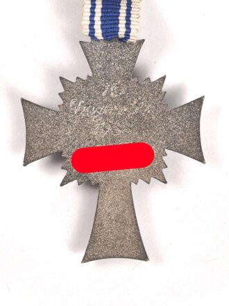 Ehrenkreuz der Deutschen Mutter in silber, guter Zustand, an langem Band
