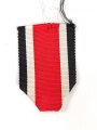 Eisernes Kreuz 2. Klasse 1939. Keine Herstellermarkierung, Hakenkreuz mit etwa 80% Lack, Bandabschnitt beiliegend
